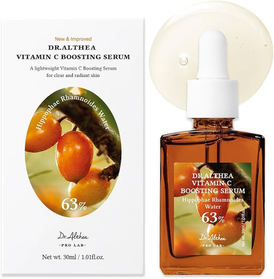 Dr Althea Vitamin C Boosting Serum in a 30ml bottle, with a clear glass container and bright orange label, placed on a white background.