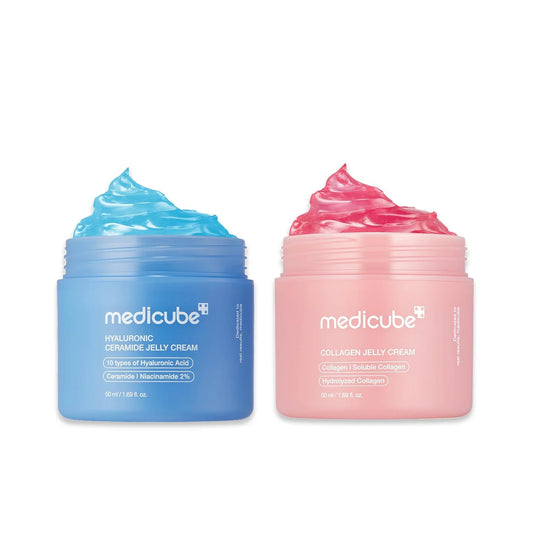 Two jars of Medicube cream, one blue and one pink, 